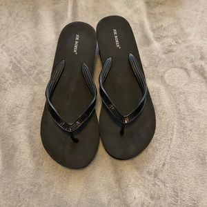 Black jeweled wedge flip flops